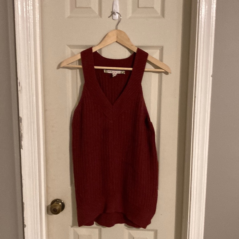 Burgundy sweater top. Sleeveless with V-neck